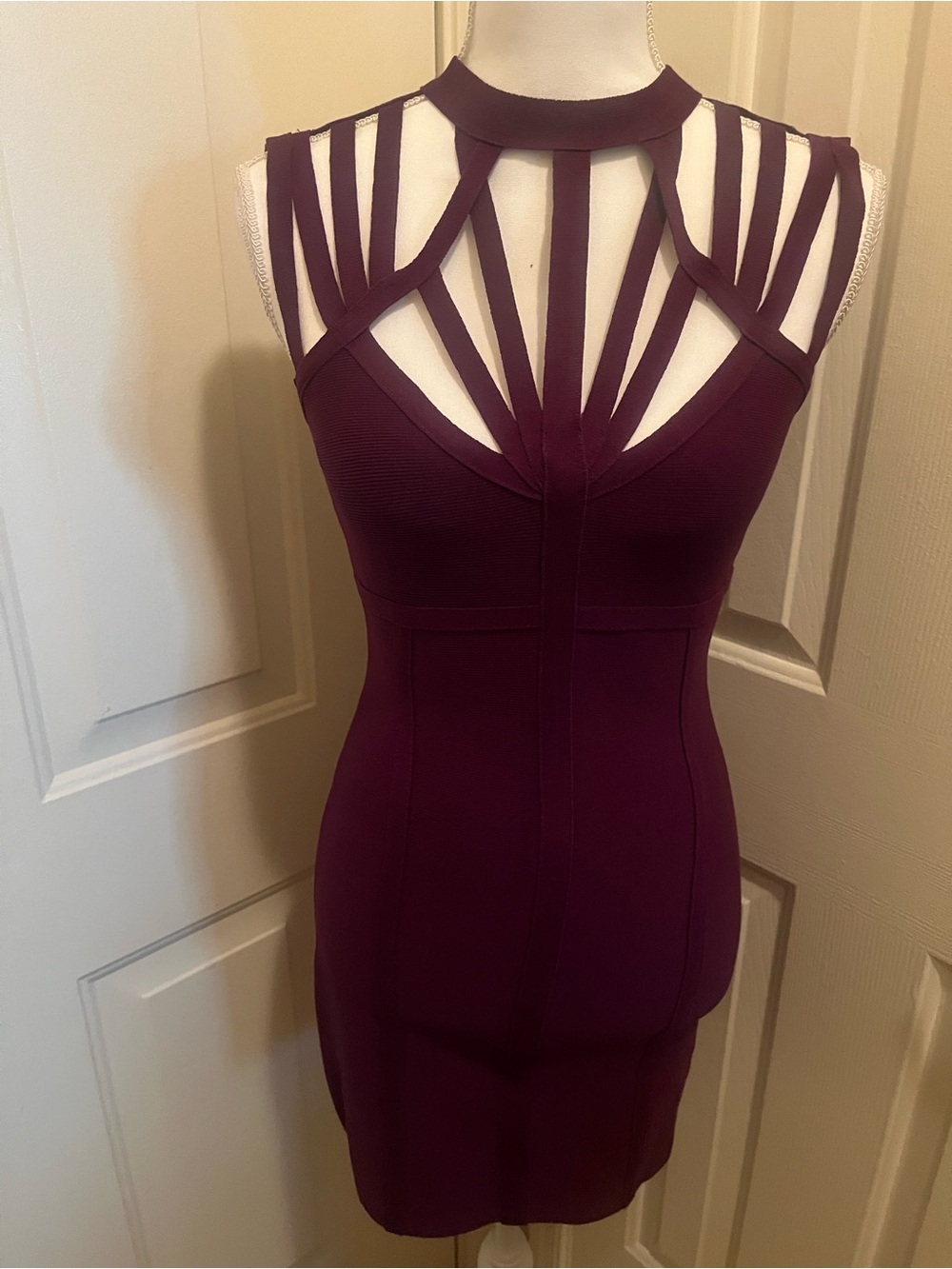Bebe Sleeveless Cutout Bodycon Dress in Deep Plum